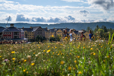 Family Hiking Outside a Jackson Gore Inn at Okemo During Summer